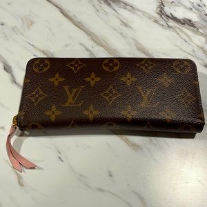 Louis Vuitton wallet under a year old.
